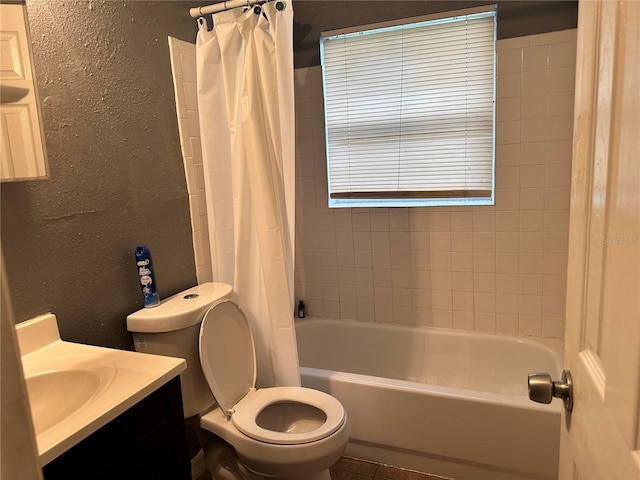 full bathroom with toilet, vanity, and shower / bathtub combination with curtain