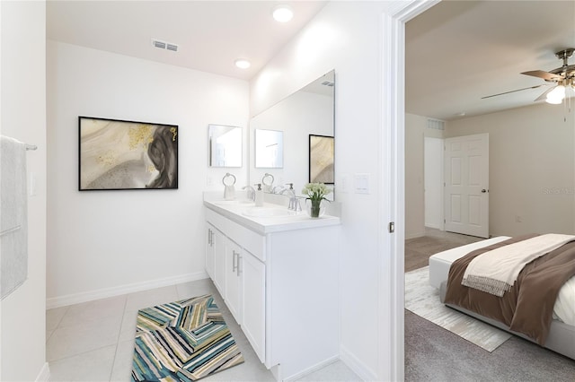 bathroom featuring vanity, tile patterned floors, and ceiling fan