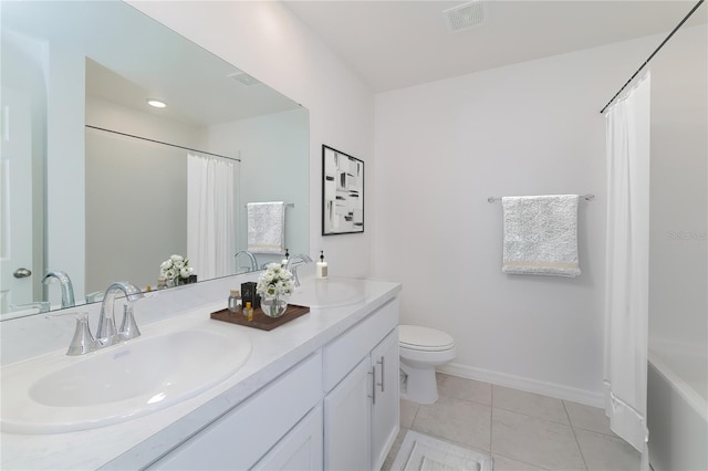 full bathroom with shower / bath combo, tile patterned flooring, vanity, and toilet