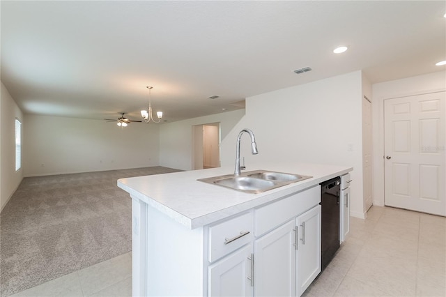 kitchen featuring light carpet, sink, an island with sink, white cabinets, and black dishwasher