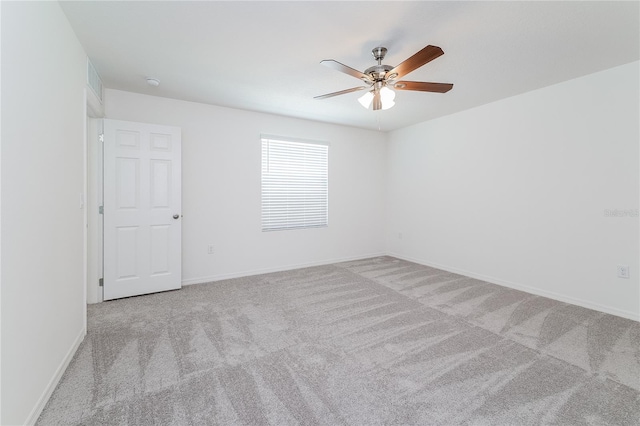 empty room with light carpet and ceiling fan