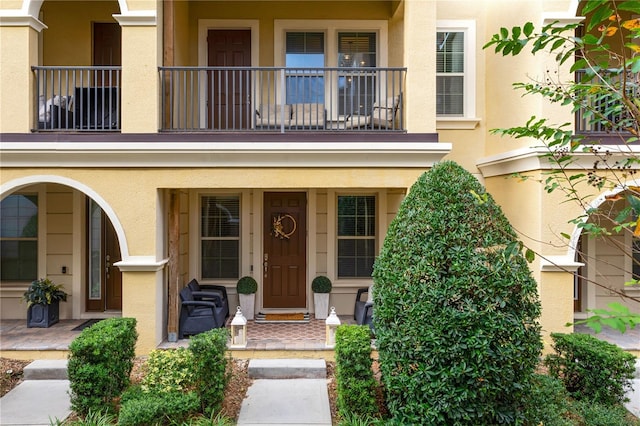 doorway to property with a balcony