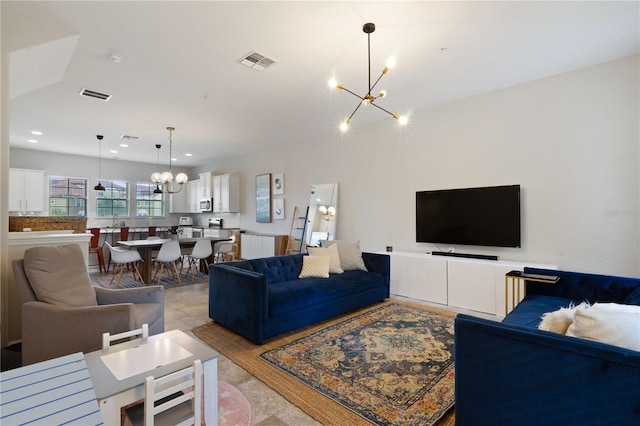 living room featuring an inviting chandelier