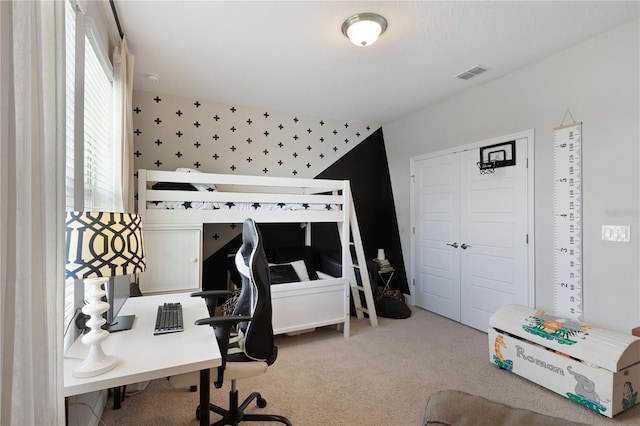 bedroom featuring carpet flooring