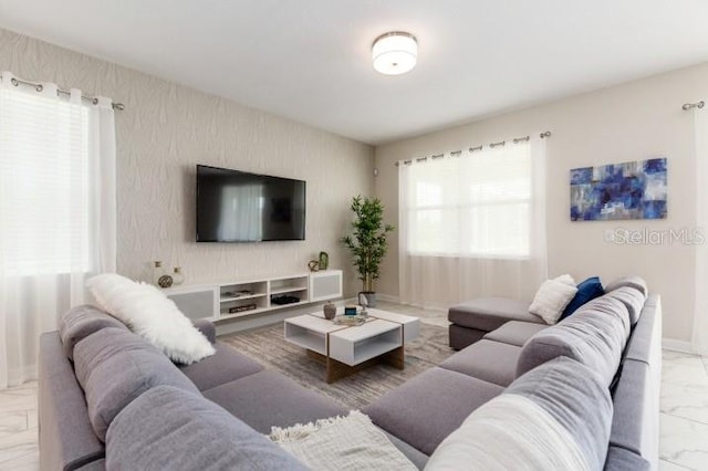 living room with plenty of natural light