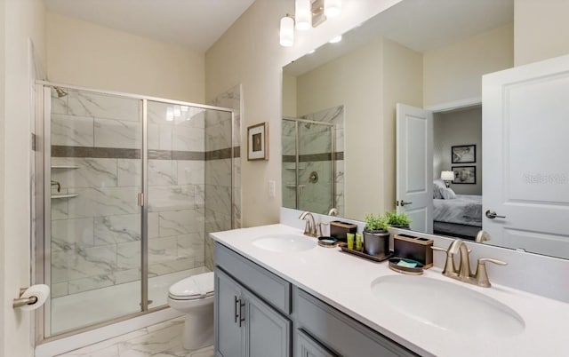 bathroom featuring walk in shower, vanity, and toilet