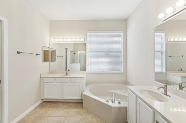 bathroom with vanity, tile patterned flooring, and separate shower and tub