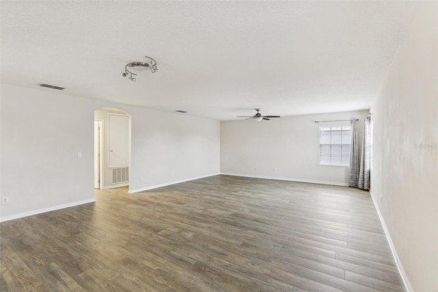 unfurnished room featuring hardwood / wood-style flooring and ceiling fan