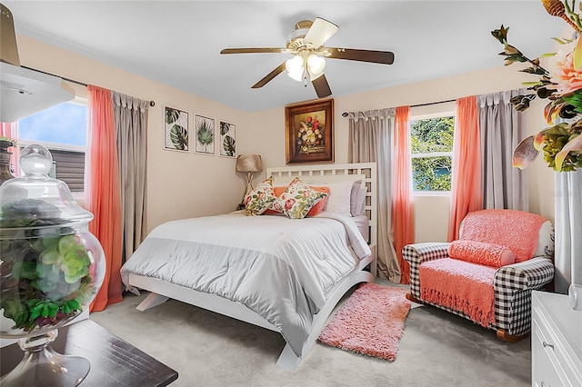 carpeted bedroom featuring ceiling fan