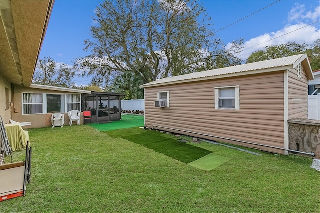 view of yard with a sunroom and cooling unit