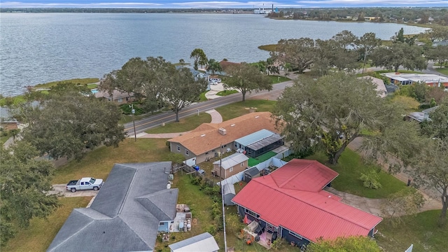 birds eye view of property featuring a residential view and a water view