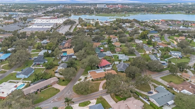 bird's eye view featuring a water view and a residential view