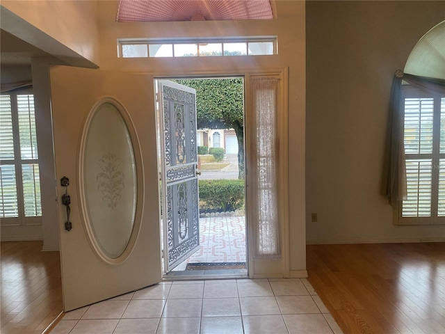 foyer with light tile patterned flooring