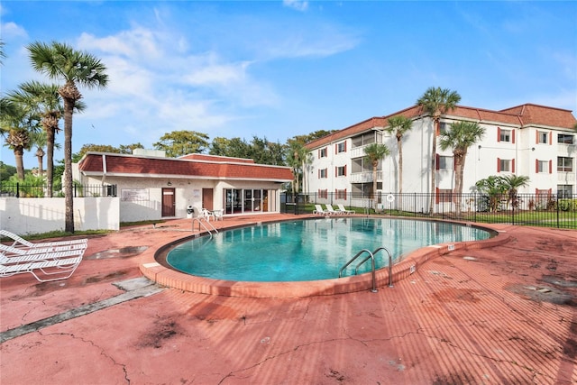 view of pool featuring a patio area