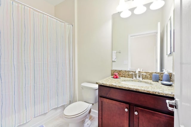 full bathroom featuring shower / bath combo, vanity, and toilet