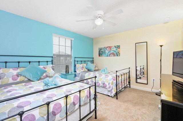 1423 Thunderbird Rd, Davenport, FL 33896 - bedroom with carpet floors, baseboards, and a ceiling fan