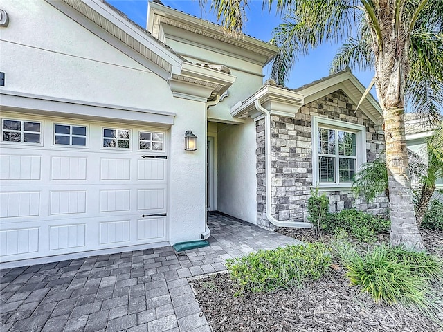 entrance to property featuring a garage