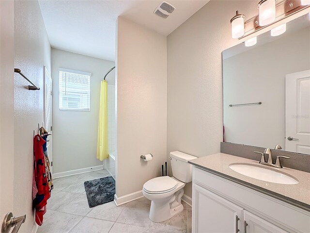 full bathroom with toilet, shower / tub combo, vanity, and tile patterned flooring