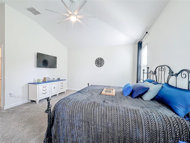 carpeted bedroom featuring vaulted ceiling and ceiling fan