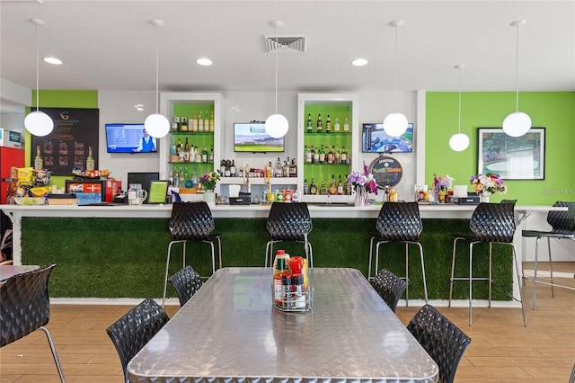 dining area with light wood-type flooring