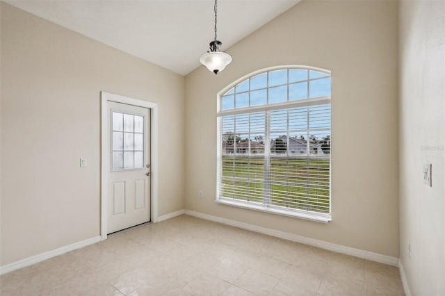 235 Royal Palm Dr, Davenport, FL 33837 - doorway to outside featuring baseboards and lofted ceiling