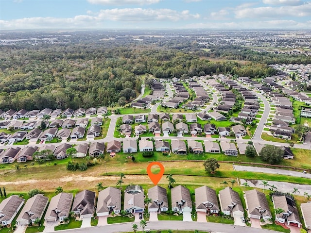 235 Royal Palm Dr, Davenport, FL 33837 - view of property location featuring nearby suburban area and a heavily wooded area