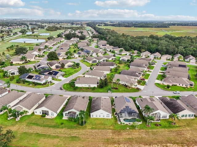 235 Royal Palm Dr, Davenport, FL 33837 - aerial view of residential area featuring a nearby body of water