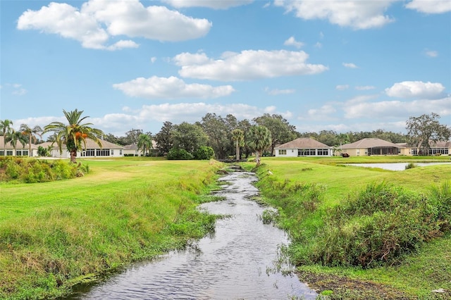 235 Royal Palm Dr, Davenport, FL 33837 - view of home's community featuring a residential view, a lawn, and a water view