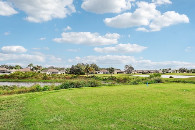 235 Royal Palm Dr, Davenport, FL 33837 - view of grassy yard with a residential view and a water view