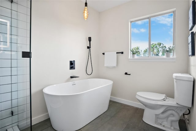 bathroom with tile patterned flooring, plus walk in shower, and toilet