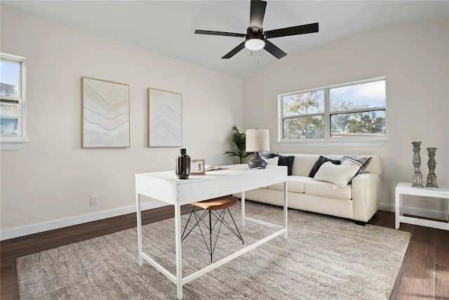 home office featuring dark hardwood / wood-style flooring, plenty of natural light, lofted ceiling, and ceiling fan