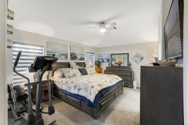 bedroom featuring light carpet and ceiling fan