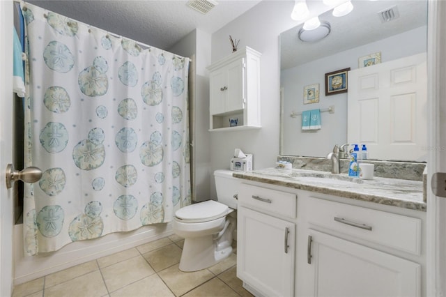 full bathroom featuring vanity, tile patterned floors, toilet, a textured ceiling, and shower / tub combo