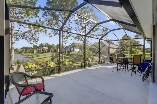 view of patio / terrace with a lanai