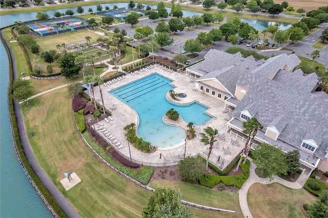 birds eye view of property featuring a water view