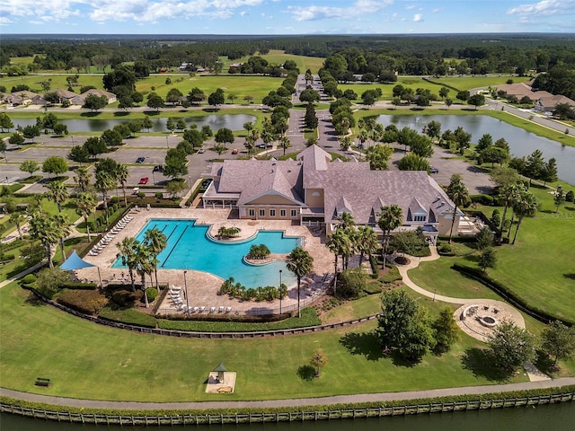 birds eye view of property featuring a water view