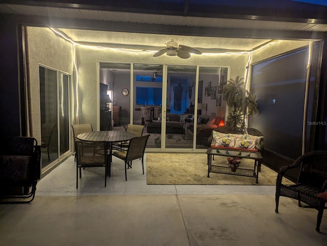 view of patio / terrace featuring ceiling fan