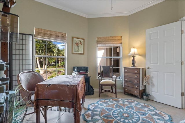 sitting room featuring crown molding and light tile patterned floors