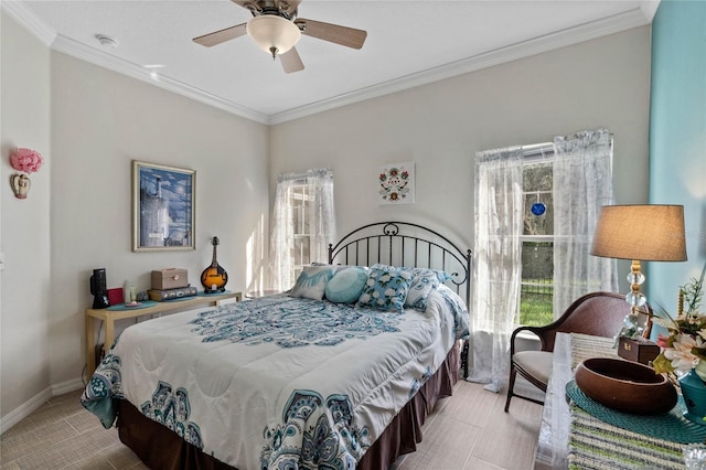 bedroom featuring ceiling fan and crown molding