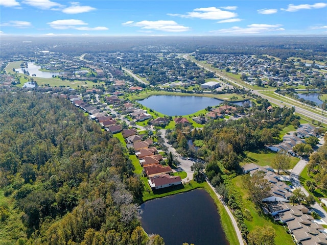 drone / aerial view with a water view