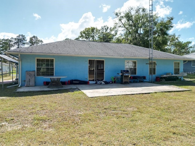 5 Oak Trl, Ocala, FL 34472 - rear view of house featuring a patio, stucco siding, and a yard