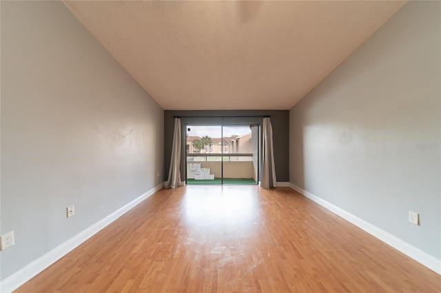 empty room with light wood-type flooring