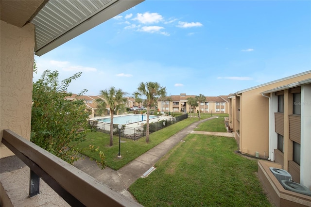 view of yard featuring a fenced in pool