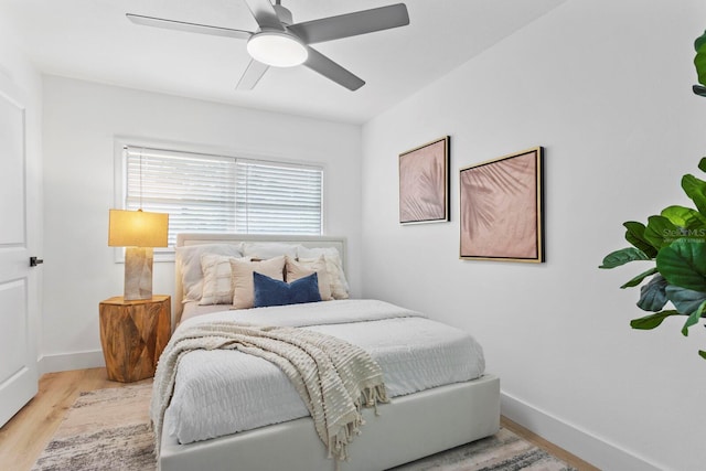 bedroom featuring ceiling fan and light wood-type flooring