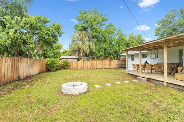 view of yard with a deck