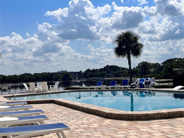 view of swimming pool with a patio