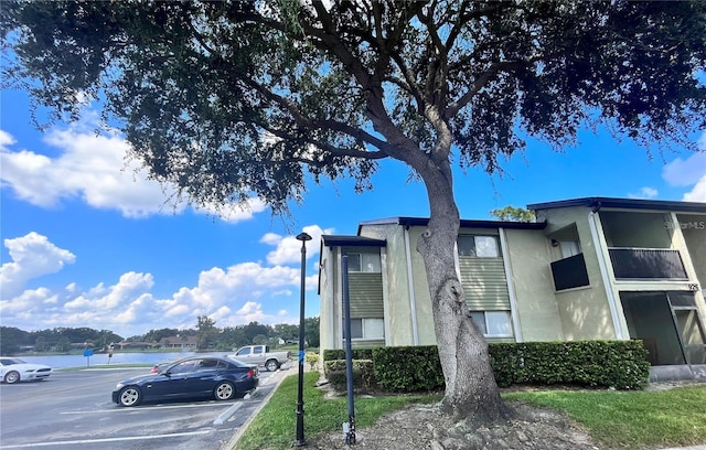 view of building exterior featuring a water view