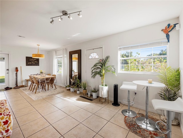 entrance foyer featuring light tile patterned floors