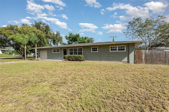 ranch-style home featuring a front yard