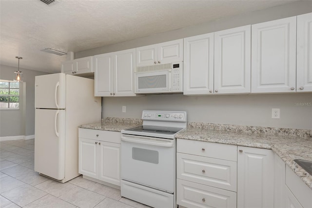 kitchen with white cabinetry, decorative light fixtures, a textured ceiling, and white appliances